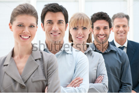 stock-photo-happy-smiling-business-team-standing-in-a-row-at-office-94460566-a